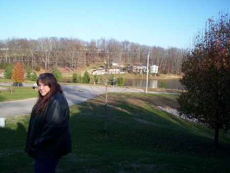 Lastest pic of my wife in front of our home