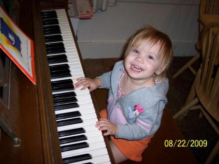 Lexis playing the piano