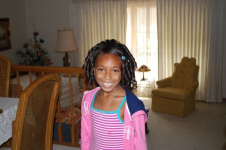 My daughter showing off her curls