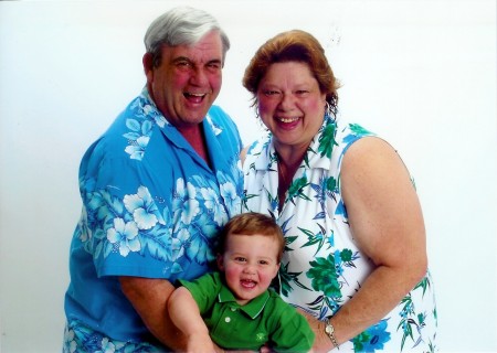 Me, Husband, and Grandson C.J. May 2009