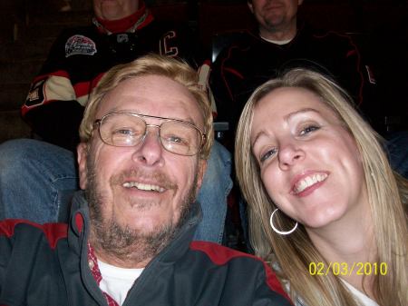 me and my daughter at a Blackhawks hockey game