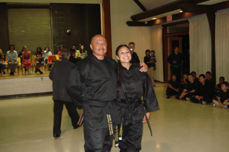 Dad and Sarah on her Black Belt promtion night