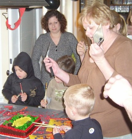 Deb cutting cake