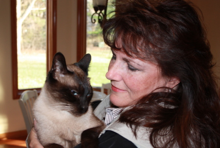 Karen (age 53) with a client's cat, "Angelo"