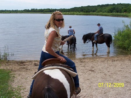 Teri riding a horse near Chicago