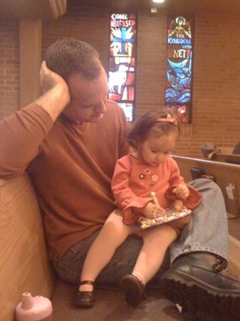 Son and daugher in church