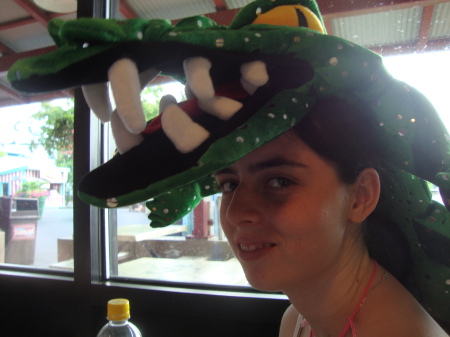 Julianne being eaten by an allegator hat