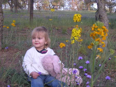 Our Grand Daughter Kamie in our front yard