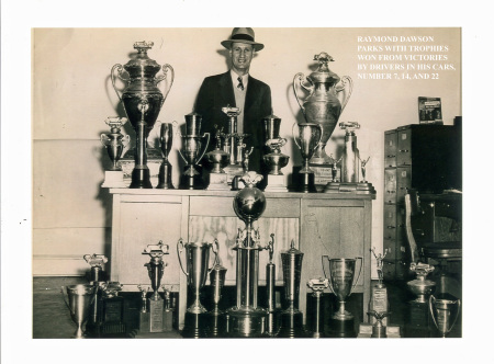 Raymond with Racing Trophies