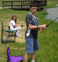 kimmie and trevor fishing the pond