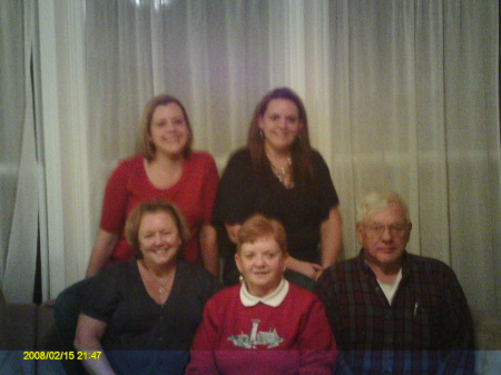 My mom, dad, and 2 sisters and me Christmas 09