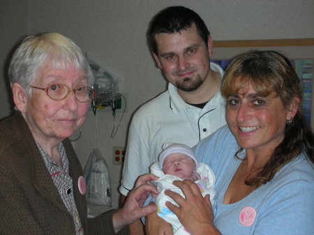 Mom, my son Ty and me and new granddaughter