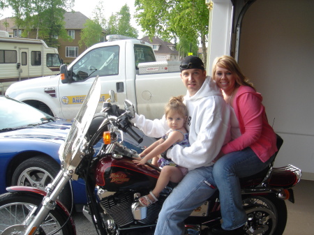 Taylor, Kourtney & Christy on Tom's Harley