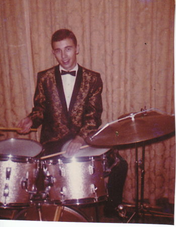 Playing drums for "The Drifters"...