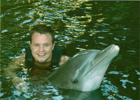 Ryan swimming with the Dolphins