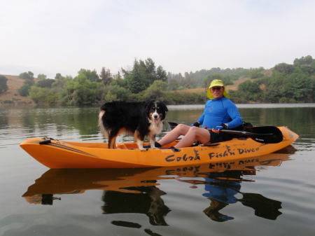 A man and his dog at the lake