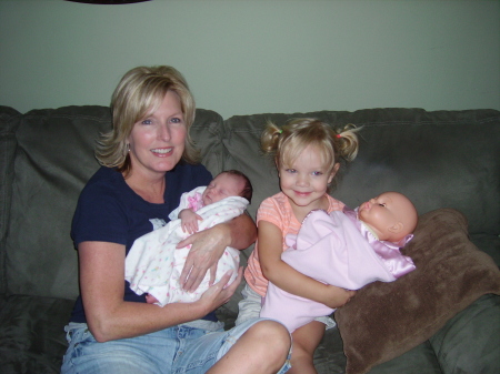 MeMe holding Coley and Rylee holding her baby