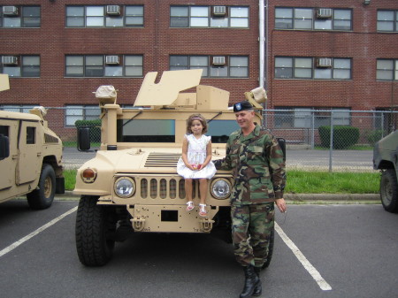 Dad and Daughter with one of Dad's HUMMVs