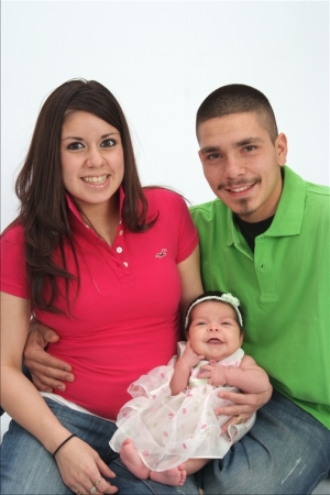 my daughter her husband and my new gbaby