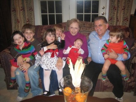 Dec 09 Linda and I with all 6 grandchildren