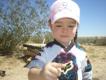 Ava, my grand-daughter  holding a bug.
