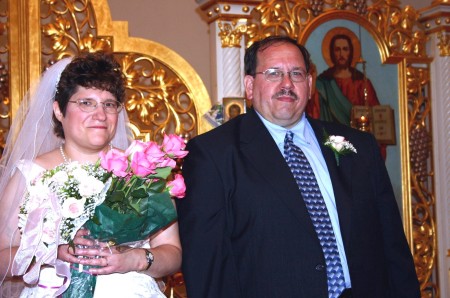 Bride and Groom at altar