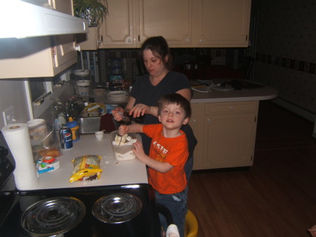 Theo helps Mommie Cook!