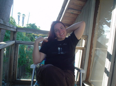 Lori on balcony at beach house