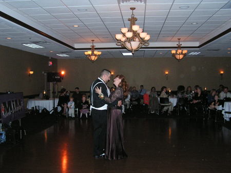 Mother and Son dance trying not to cry.