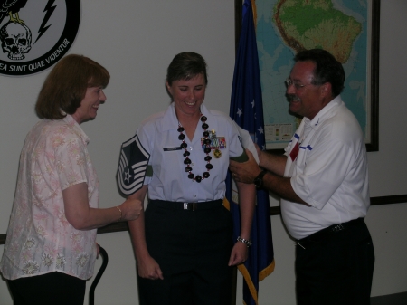 Mom and Dad pinning me on at promotion.