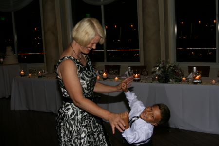 Mom and Tyler dancing.