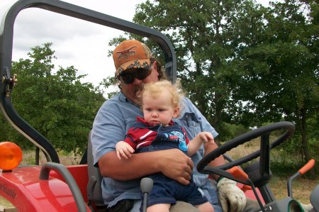 Lane & Grandpa Bruce on the tractor