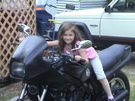 MY GRANDDAUGHTER ON MY BIKE