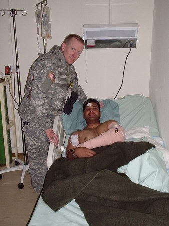 Visiting wounded soldier at Ibn Sina hospital