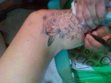 my knew tat too cover up a big scar