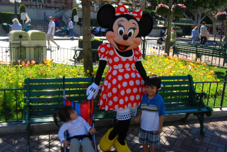 day at disney with 2 of our 9 grandchildren