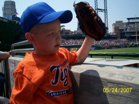 Jordan at the tiger game ready to catch one