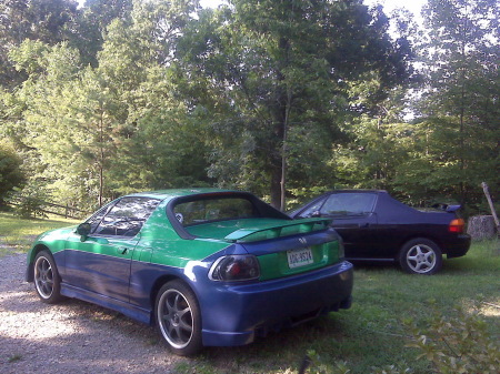 Mike's Del Sol Larry put a body kit & painted.