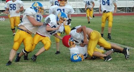 Ethan #51 playing football