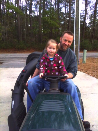 Me and Bethanie on the mower