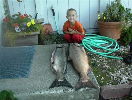 My youngest grandson, Logan with his catch