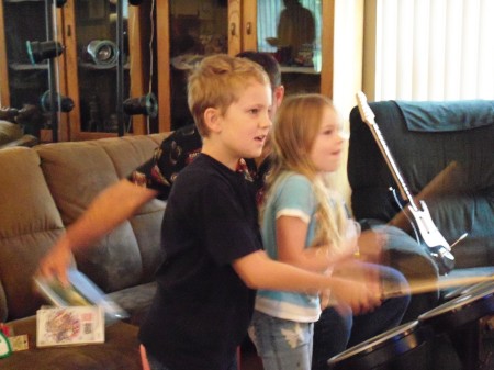 Grandchildren play Rock Band