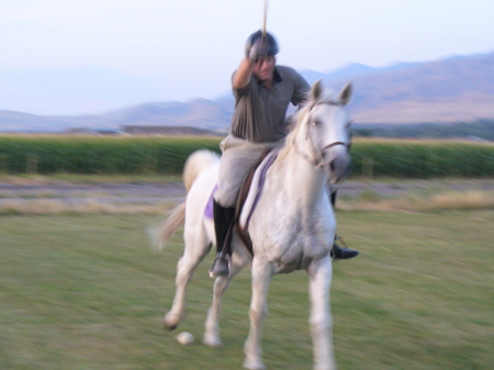 Scott playing polo on our old horse "Lucky"