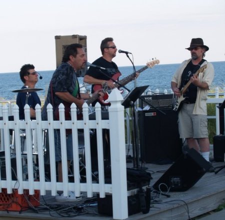 Miles Road Playing At Smith Point Beach Hut