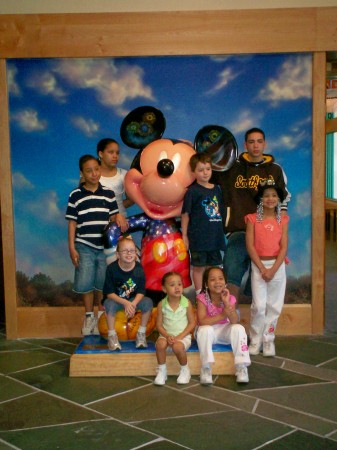 Mickey and 8 of our grandkids