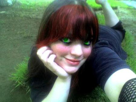 me  laying in grass