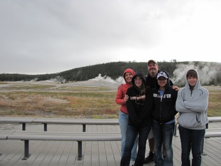 Waiting for Old Faithful in the rain!