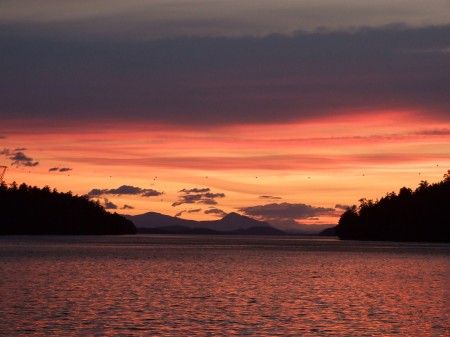 Sunset from the beach in front of our home