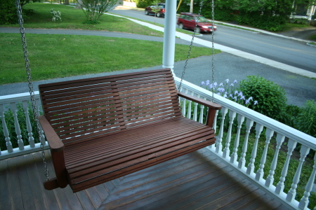 Porch swing is waiting for visitors