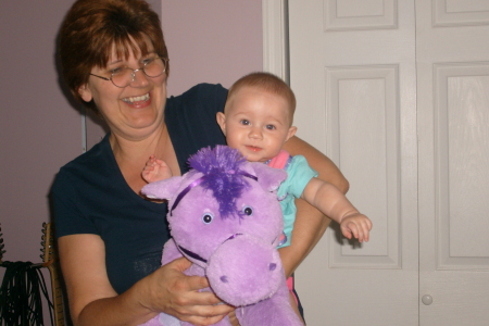 Kaydie riding her horsey [w/ grandma's help]